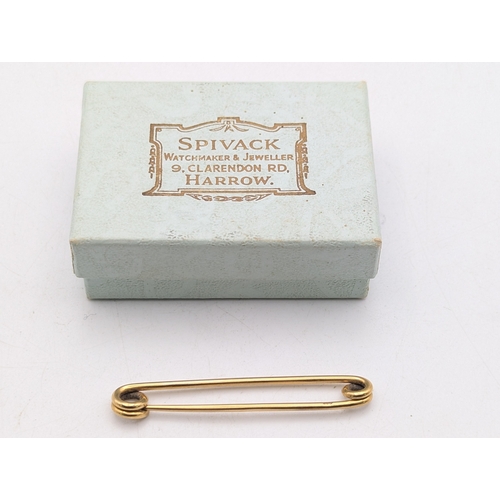 12 - An 18ct yellow gold bar brooch stamped 18, weight 4g, 5cm L
Location: C1
If there is no condition re... 