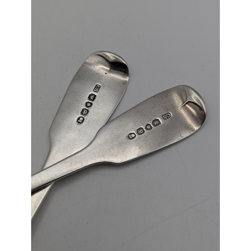 24 - A pair of George IV silver fiddle pattern spoons hallmarked London 1830, total weight 119.6g
Locatio... 