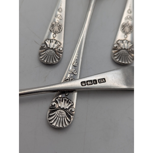 27 - A set of six Edwardian silver teaspoons with decorative terminals, hallmarked Sheffield 1909, total ... 