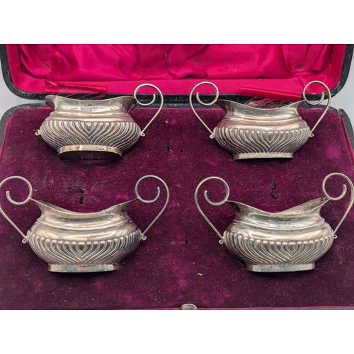 3 - Four Edwardian silver salts with twin handles one A/F hallmarked Sheffield 1909 by Walker and Hall h... 