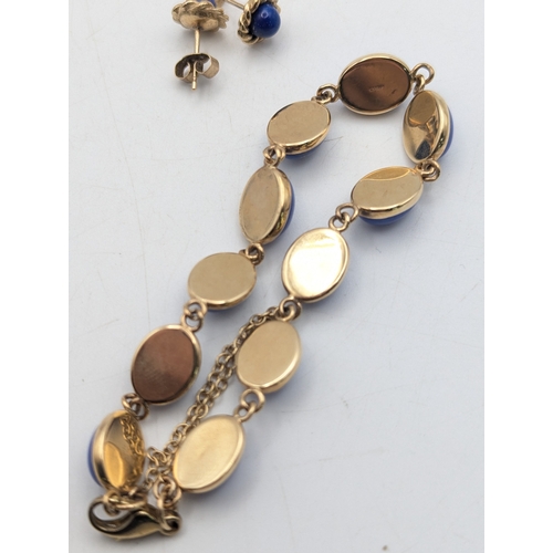39 - A 9ct yellow gold and lapis lazuli linked bracelet with lobster claw clasp total weight 10.6g along ... 