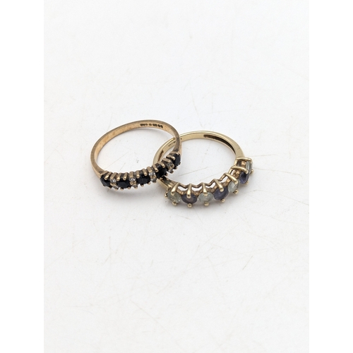 49 - Two 9ct yellow gold rings, one set with sapphires and diamonds size N1/2 and other set with paste st... 