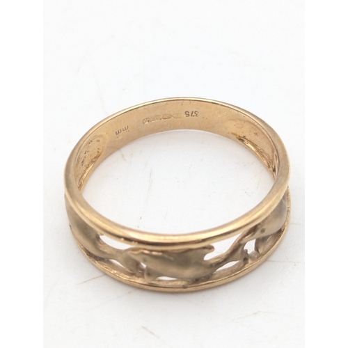 50 - A 9ct gold ring with pierced panel decorated with three seahorses, weight 2.4g, size P1/2
Location: ... 