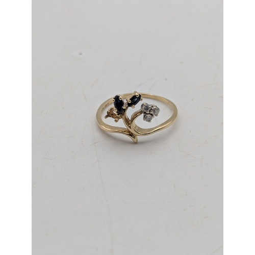 55 - A14ct yellow gold diamond and sapphire floral ring with one sapphire missing, size S, weight 2.7
Loc... 