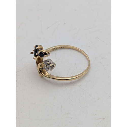 55 - A14ct yellow gold diamond and sapphire floral ring with one sapphire missing, size S, weight 2.7
Loc... 