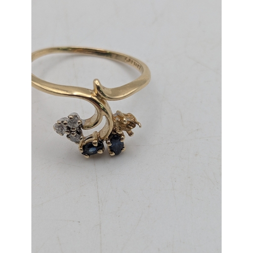 55 - A14ct yellow gold diamond and sapphire floral ring with one sapphire missing, size S, weight 2.7
Loc... 