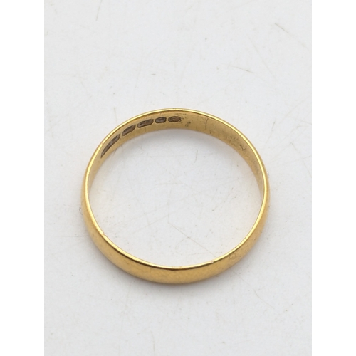 7 - A 22ct yellow gold wedding band stamped 22 with British hallmarks, size P1/2, weight 2.5g
Location: ... 