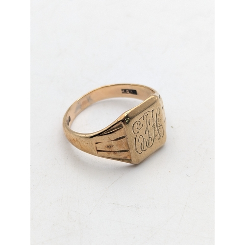 8 - A 9ct yellow gold signet ring engraved with initials EFH with a tapering shank, stamped 375 with Bri... 