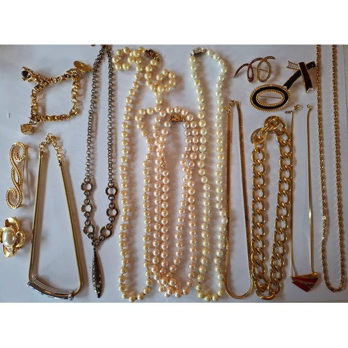 29 - Monet- A collection of 1980's and 90's gold tone costume jewellery to include 5 brooches, simulated ... 