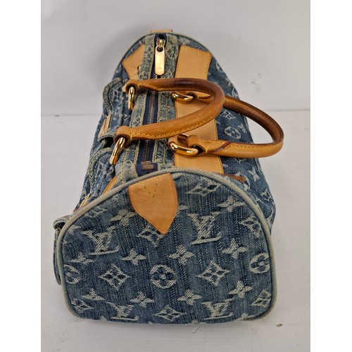 3 - Louis Vuitton- A Neo Speedy handbag in blue cloth denim with monogram design date stamp code SP0096,... 