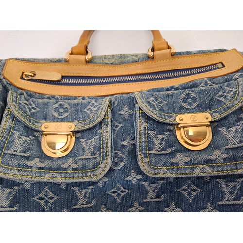 3 - Louis Vuitton- A Neo Speedy handbag in blue cloth denim with monogram design date stamp code SP0096,... 