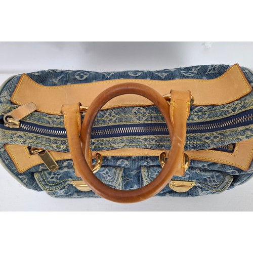 3 - Louis Vuitton- A Neo Speedy handbag in blue cloth denim with monogram design date stamp code SP0096,... 