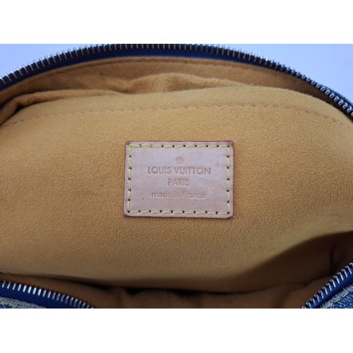 3 - Louis Vuitton- A Neo Speedy handbag in blue cloth denim with monogram design date stamp code SP0096,... 
