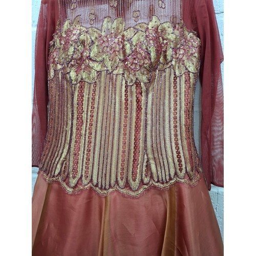 46 - Anthony Price-A 1980's burnt orange ball gown with gold and panelled bodice with pink bead embroider... 