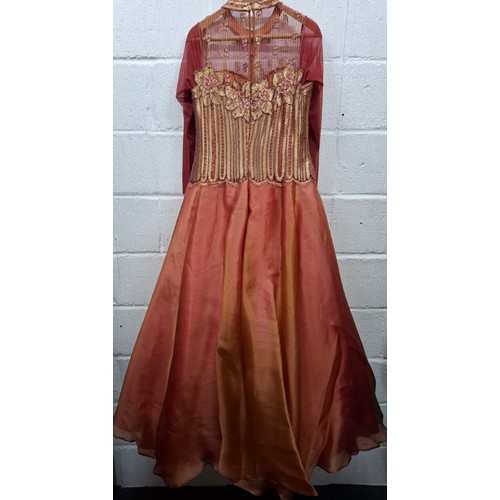46 - Anthony Price-A 1980's burnt orange ball gown with gold and panelled bodice with pink bead embroider... 