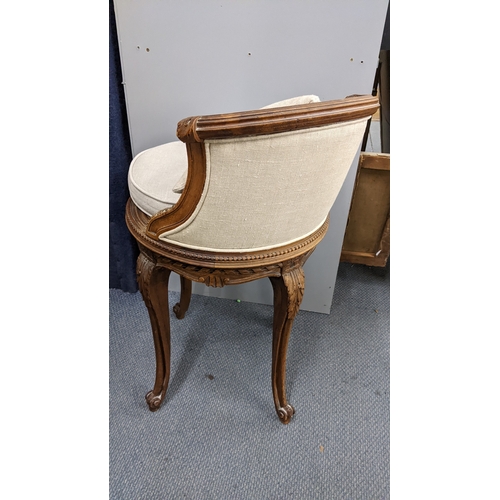 23 - A late 19th century French piano stool having a cared frame with a curved back, acanthus leaf carved... 