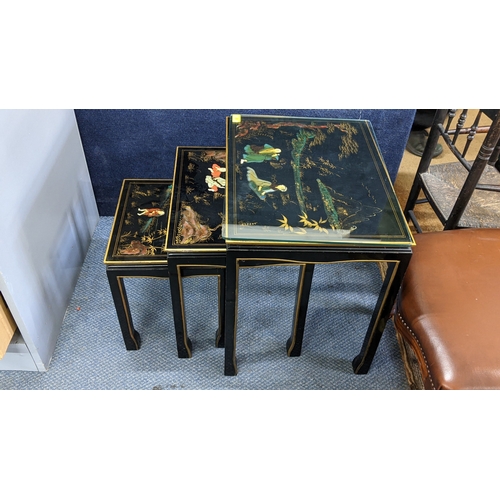 28 - A Chinese black lacquered nest of tables, the largest 49cm h x 49.5cm w Location: A2B
If there is no... 