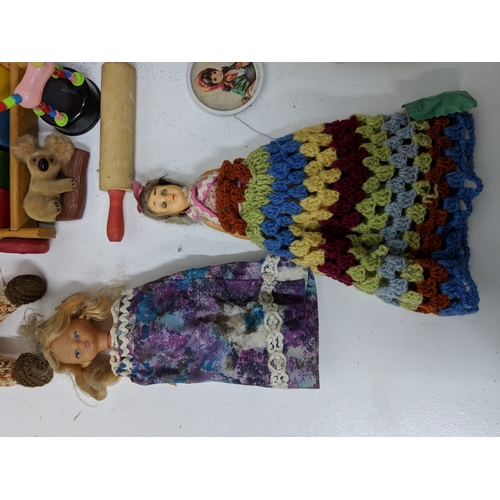 10 - Mixed toys to include some soft examples to include a skipping rope, building blocks, a tiny tears d... 