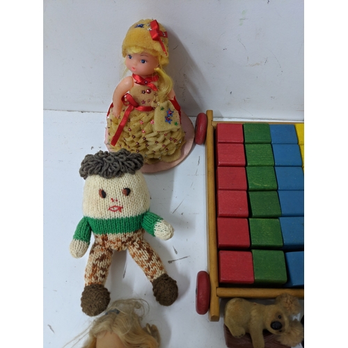 10 - Mixed toys to include some soft examples to include a skipping rope, building blocks, a tiny tears d... 