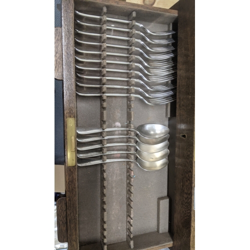 49 - A vintage Mappin and Webb silver plated part canteen of cutlery featuring three layers housed in an ... 