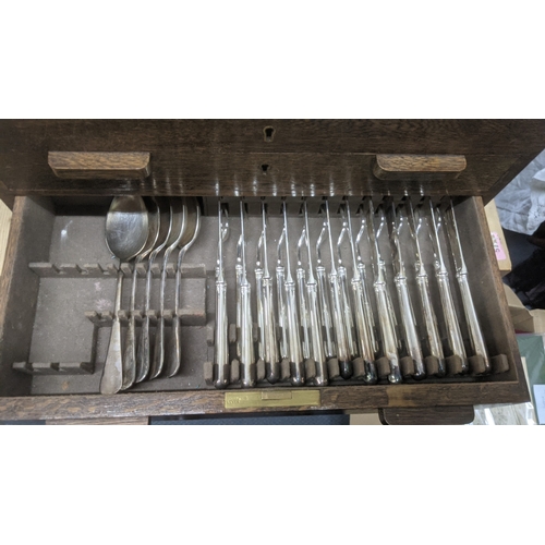 49 - A vintage Mappin and Webb silver plated part canteen of cutlery featuring three layers housed in an ... 