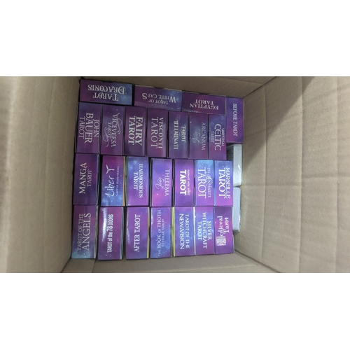 55 - A collection of tarot cards related items to include magazines, cards and other items Location: GM
I... 