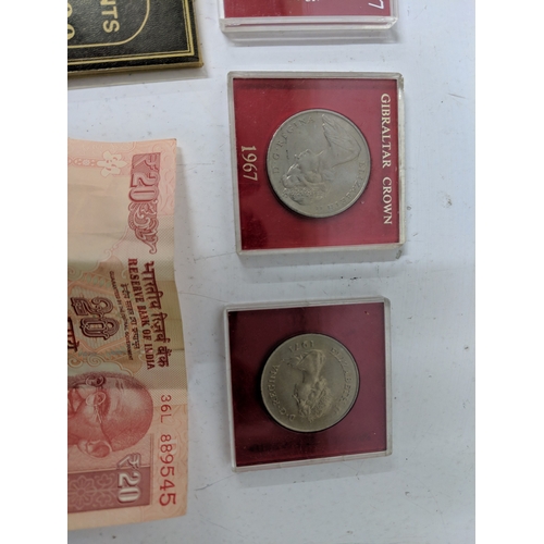 7 - Assorted coinage mostly from the UK but including some foreign coins and some commemorative examples... 