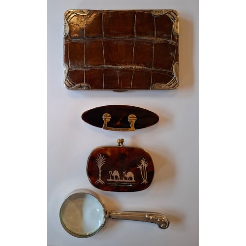40 - A circa 1900's brown crocodile cigarette case A/F with silver frame and corners, makers mark LK (Lud... 