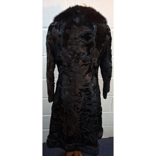 33 - A group of 5 vintage fur coats A/F to include a 1960's Persian black lamb coat with black mink colla... 