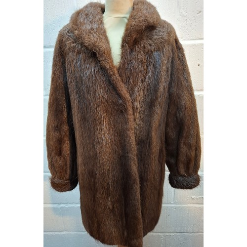 33 - A group of 5 vintage fur coats A/F to include a 1960's Persian black lamb coat with black mink colla... 