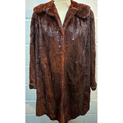 33 - A group of 5 vintage fur coats A/F to include a 1960's Persian black lamb coat with black mink colla... 