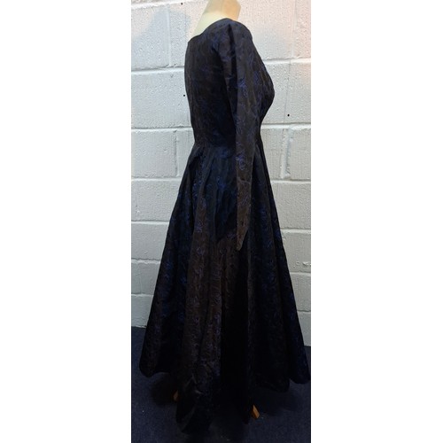 34 - A mid 20th Century blue brocade full length dress with gathered skirt and button cuffs, approx 32/34... 
