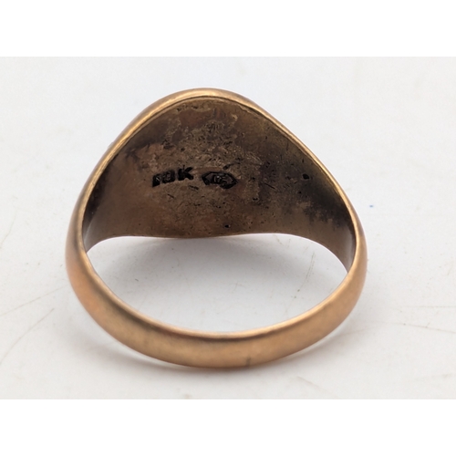 30 - A 10k rose gold signet ring with engraved initials and a tapering shank, size Q, weight 6g
Location:... 