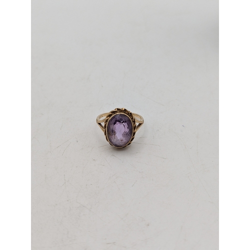 50 - A yellow metal and faceted cut amethyst dress ring tested as 9ct gold, size P1/2, weight 4.5g 
Locat... 