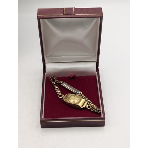 53 - A mid 20th century 14ct yellow gold cased ladies Anker wrist watch on a gold plated bracelet, total ... 