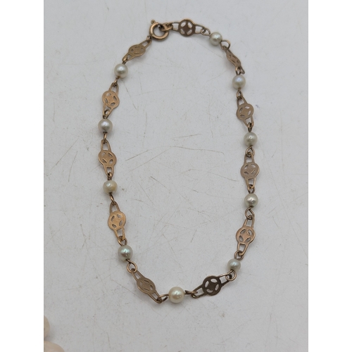 55 - A 9ct yellow and pearl bracelet with a spring ring clasp 19.5cm L 2.1g together with a pearl necklac... 