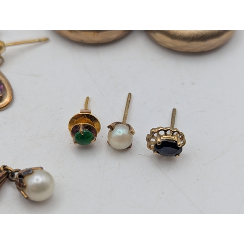 58 - A collection of earrings to include two pairs of 9ct gold earrings 3.5g,  9ct gold stud earrings 2.7... 