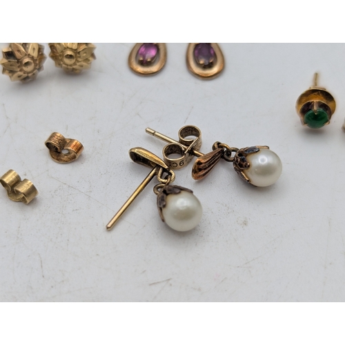 58 - A collection of earrings to include two pairs of 9ct gold earrings 3.5g,  9ct gold stud earrings 2.7... 