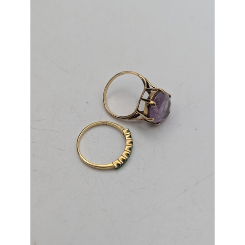 7 - Two yellow gold rings to include a 14ct emerald stone ring size O 1.5g stamped 585 together with yel... 
