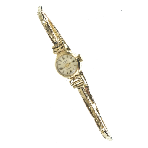 16 - A Rotary, manual wind, ladies, 9ct gold wristwatch, the circular dial having baton markers, fitted w... 
