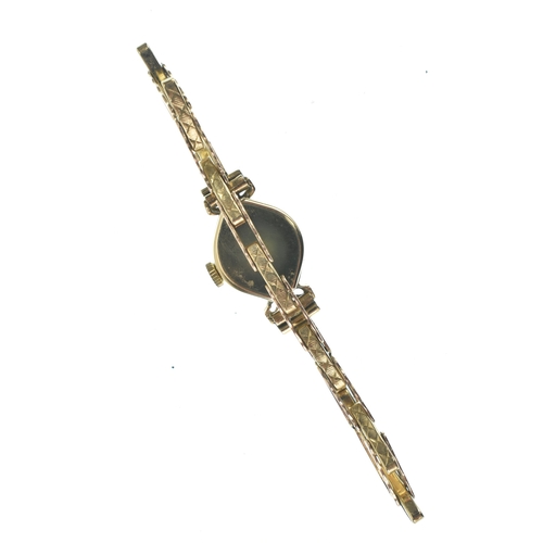 16 - A Rotary, manual wind, ladies, 9ct gold wristwatch, the circular dial having baton markers, fitted w... 