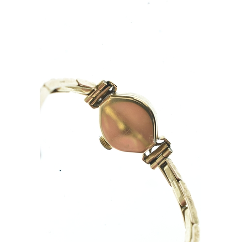 16 - A Rotary, manual wind, ladies, 9ct gold wristwatch, the circular dial having baton markers, fitted w... 