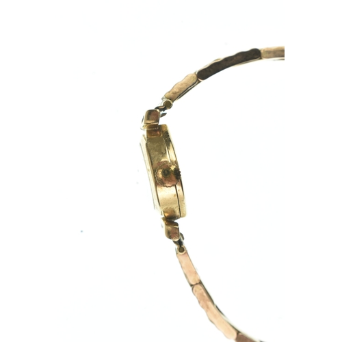 16 - A Rotary, manual wind, ladies, 9ct gold wristwatch, the circular dial having baton markers, fitted w... 