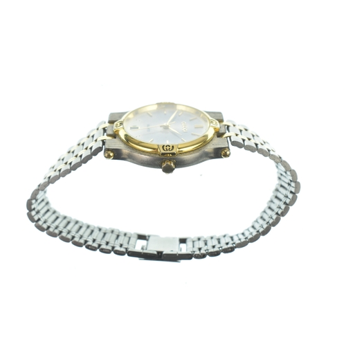 19 - A Gucci 9000L, quartz, ladies bi-metal wristwatch, circa 1990s, the dial with gilt baton hour marker... 