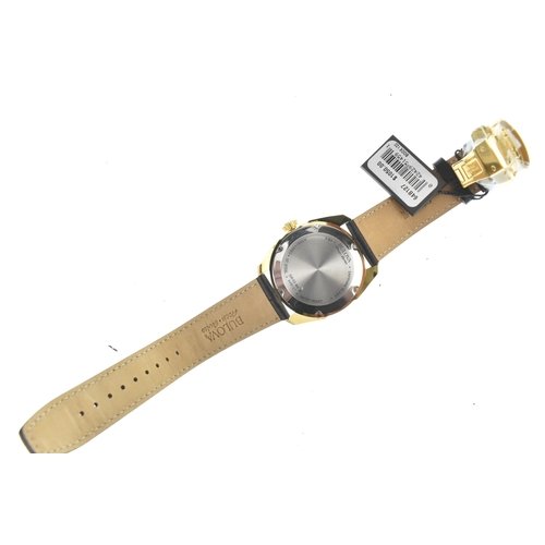 40 - A Bulova Accu-Swiss Automatic, gents gold-plated wristwatch, the dial with applied baton hour marker... 
