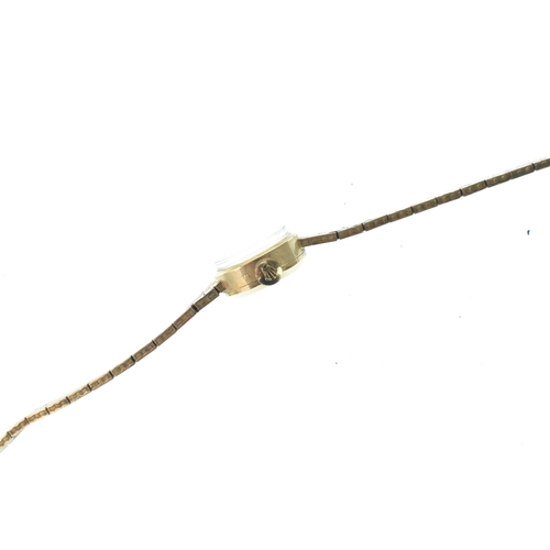 47 - A Rolex Precision, manual wind, ladies, 9ct gold wristwatch, the silvered dial with applied gilt bat... 
