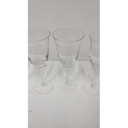 23 - A collection of six Flights of Fantasy Goodwood Concorde wine glasses with twisted stems Location: A... 