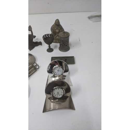 26 - Collectables to include a brass figure of a Buddah and two vintage G.P.O whistles.
Location: A2F
If ... 