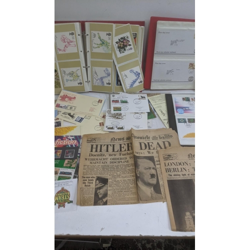 57 - Collection of postcards, First Day covers and stamps and 1945 newspapers
Location: GL
If there is no... 