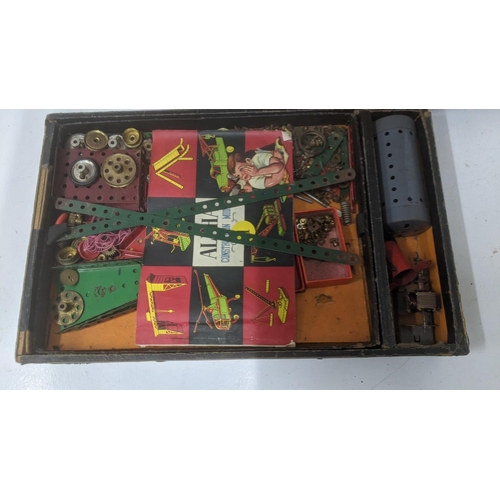 59 - Toys and games to include a vintage Meccano set 3, a collection of Topps 1980's American football co... 